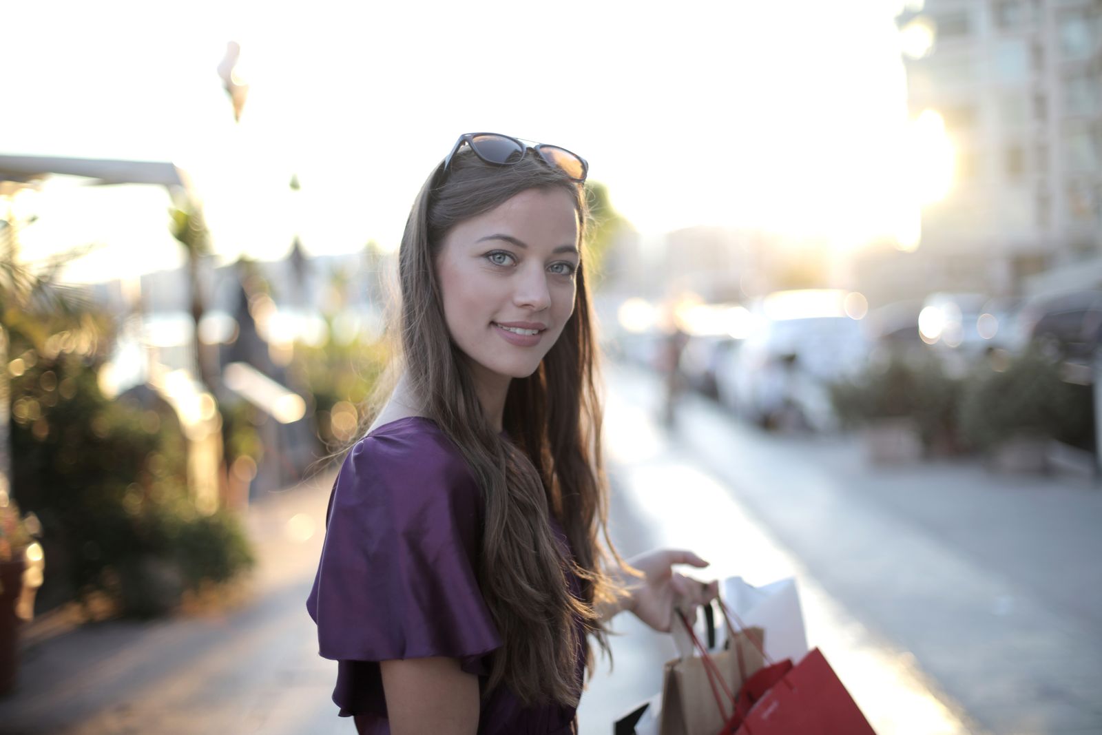 GTO member carrying shopping bags