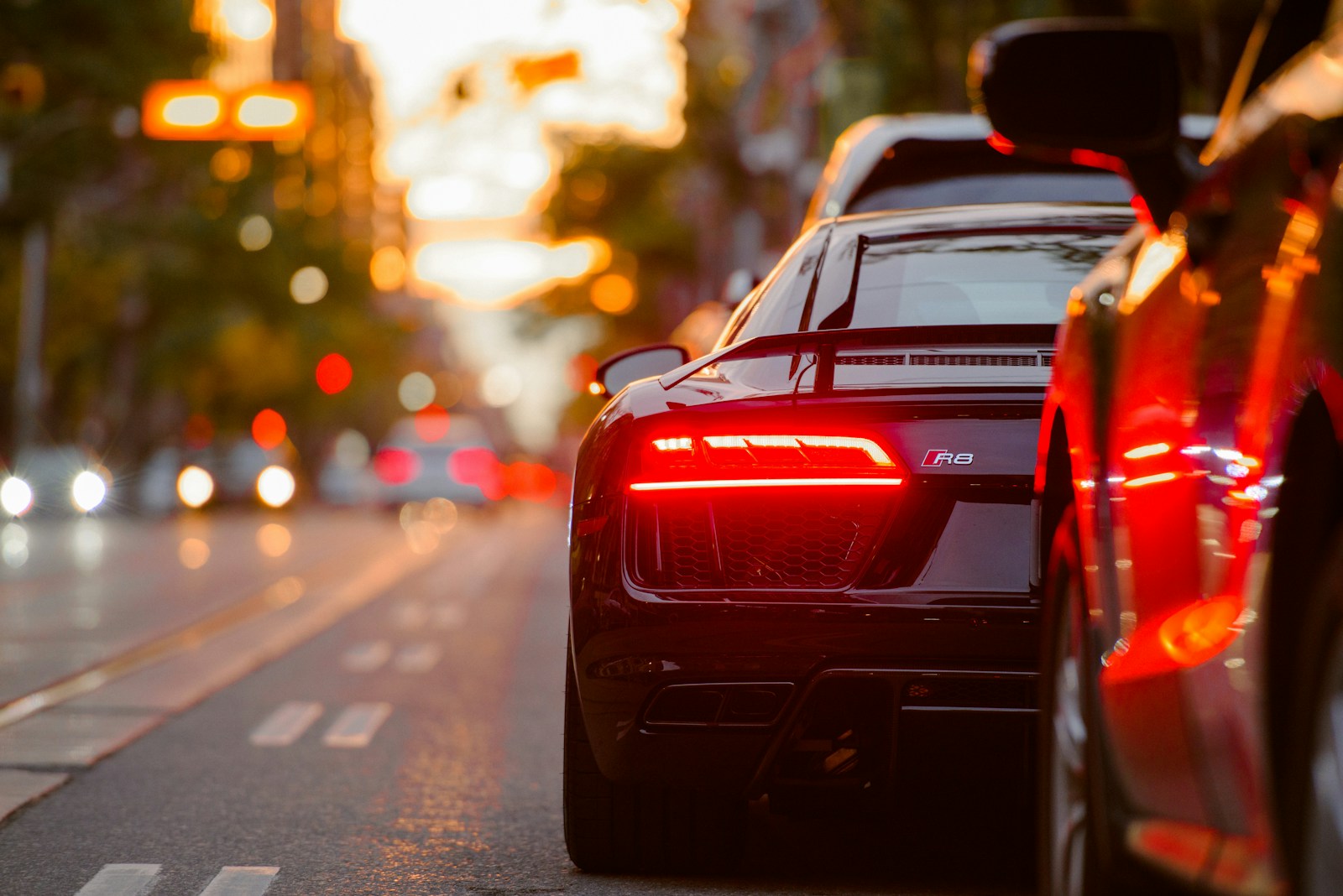 Premium rental car driving through a city