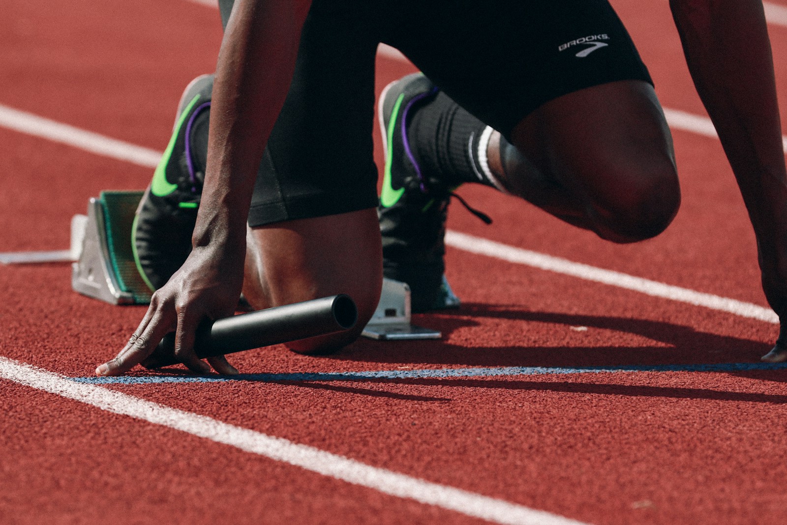 Athlete preparing to start a track event